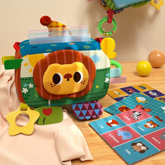 Cutie senzorială Montessori cu șervețele textile și accesorii interactive